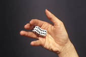 Dice in palm, close up Dice in palm, close up